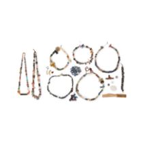 A collection of beads, a bone fragment and an amethyst necklace  Various dates Comprising nine ...