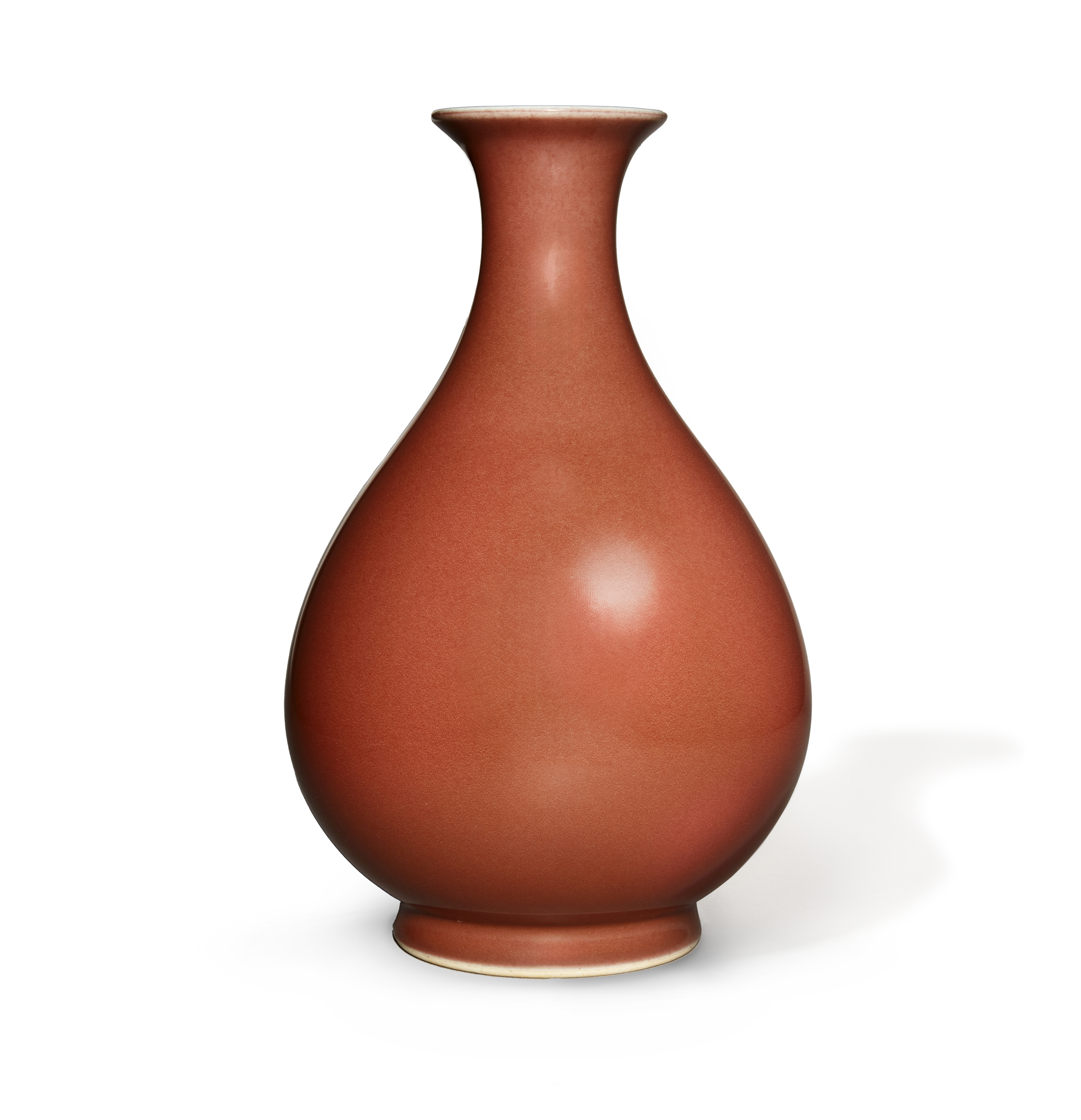 A Chinese copper-red-glazed pear-shaped vase, yuhuchun Qianlong seal mark and of the period Wel...