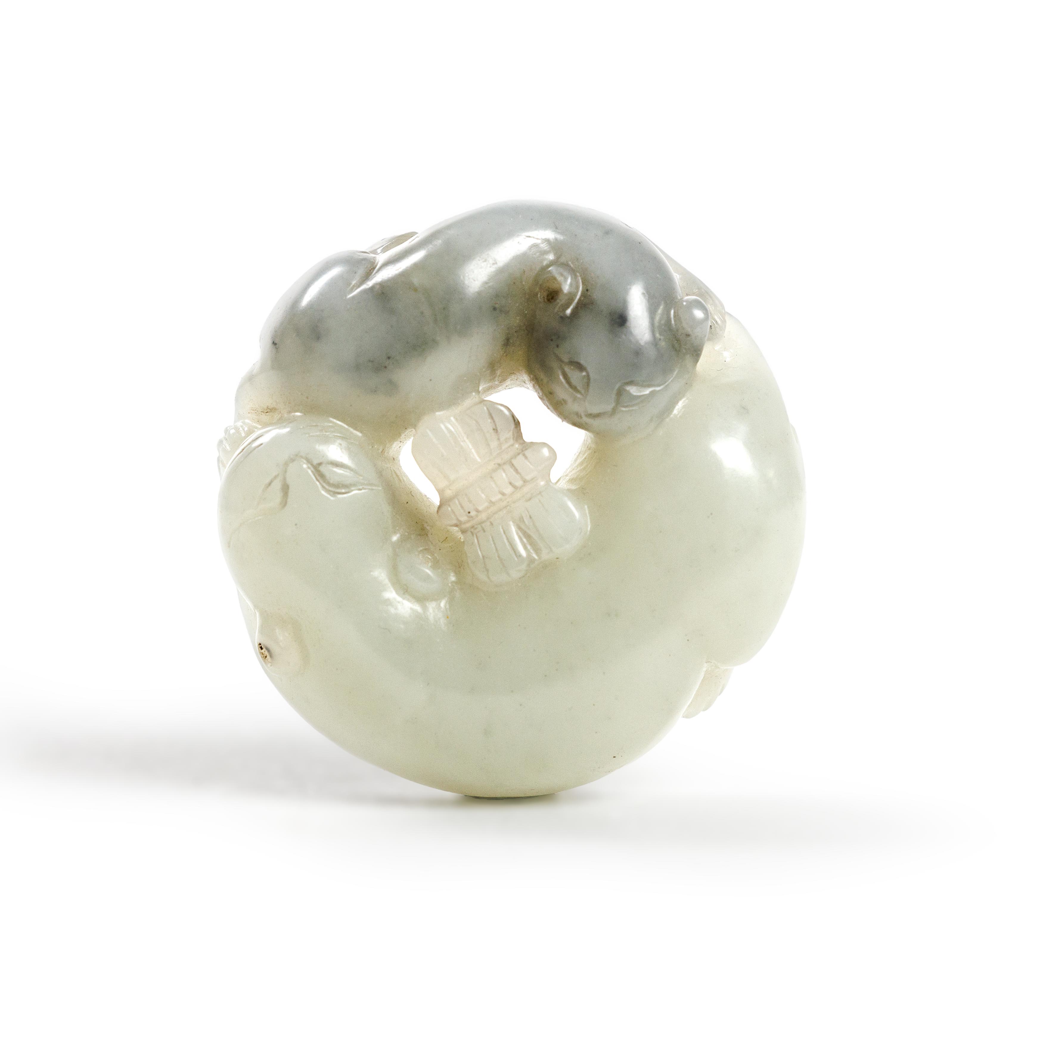 A Chinese grey and celadon jade carving of two cats Qing dynasty, 18th/19th century Carved in r...
