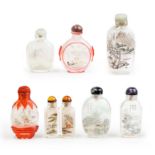 Seven Chinese inside-painted snuff bottles 20th century Comprising: three painted with landscap...