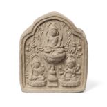 A small Tibetan clay votive plaque, tsatsa Early Ming dynasty, 14th/15th century Moulded with a...