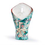 A Japanese Kutani wall vase Meiji period Moulded as wrapped envelope with a bowl tie, painted w...