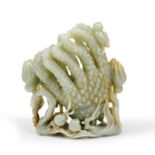 A large Chinese green jade 'monkey and finger citron' group 20th century The large green stone ...