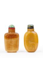 Two Chinese carved amber-colour agate snuff bottles Late Qing dynasty The first, of rectangular...