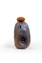 A Chinese 'silhouette' agate pebble-form snuff bottle Qing dynasty, 19th century The small pebb...