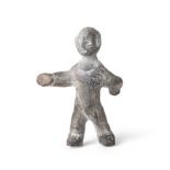 A Chinese grey pottery figure of a child walking Han dynasty 10cm high.  Provenance: Mu-Fei Co...