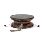 A large Tibetan wooden ritual drum, damaru 19th/20th century The hand-held instrument inlaid wi...