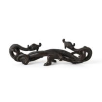 A Chinese bronze 'double-chilong' brush rest Yuan dynasty Cast as a pair of chi-dragons in oppo...