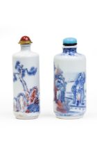 Two Chinese underglaze red and blue cylindrical snuff bottle Late Qing dynasty The first finely...