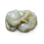 A Chinese green jade carving of a lion and cub Qing dynasty, 19th century The recumbent lions h...