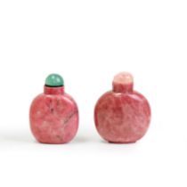 Two Chinese pink rhodonite snuff bottles Late Qing dynasty Both well-hollowed, the first standi...