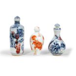 Two Chinese blue and white and underglaze red and one iron red snuff bottle 20th century, two ap...