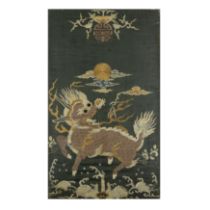 A Chinese embroidered black silk 'qilin' panel Late Ming/early Qing dynasty, 17th century The b...