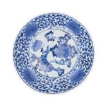 A large Japanese Arita blue and white dish Edo period The dish with deep sides rising to foliat...