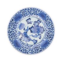 A large Japanese Arita blue and white dish Edo period The dish with deep sides rising to foliat...