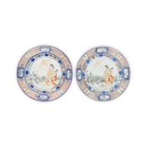 A pair of Japanese Imari-ware 'La Dame au Parasol' plates Edo period Each painted in underglaze...