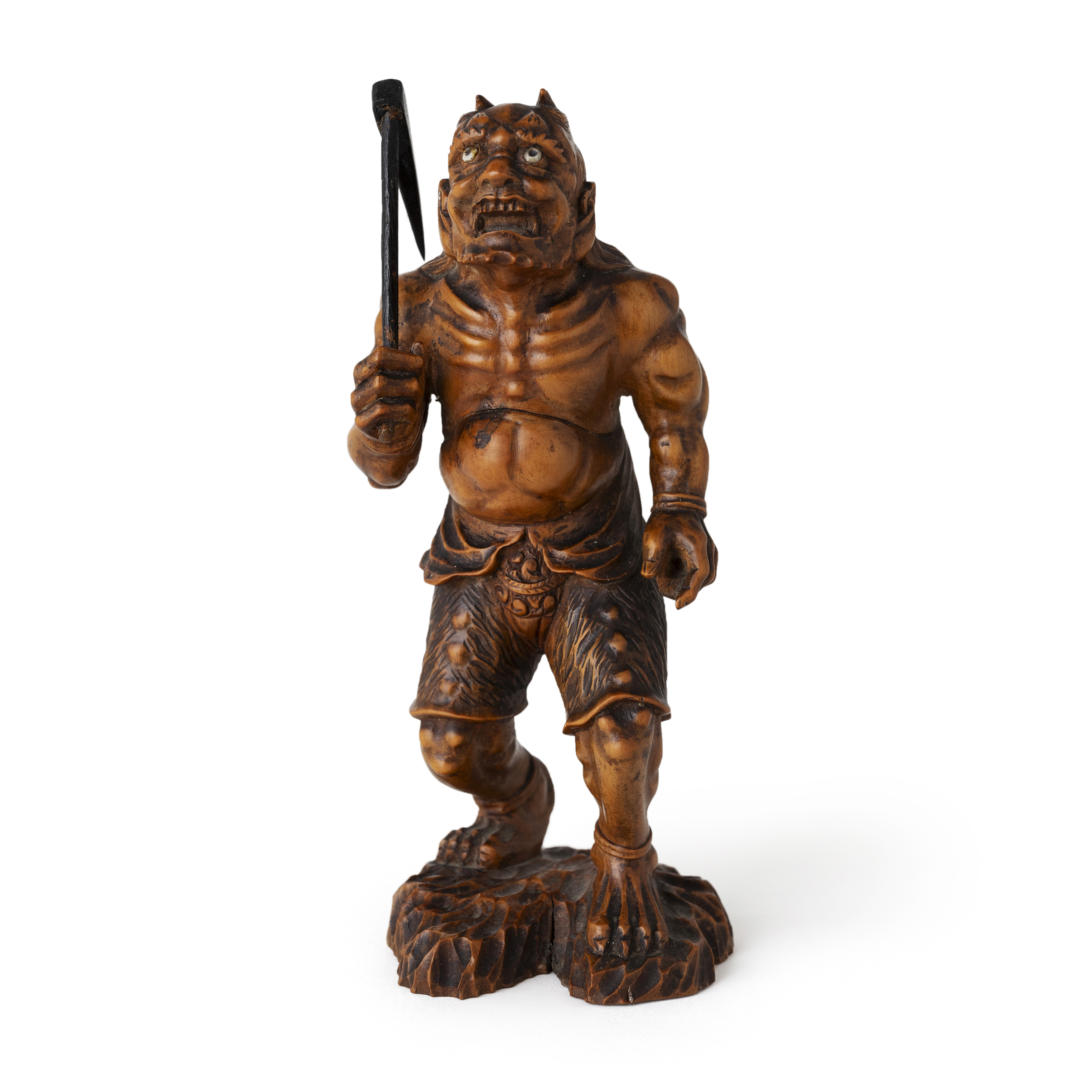 A Japanese boxwood okimono of an Oni Meiji period, signed Kogetsu Finely carved as a muscular h...