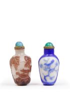 Two Chinese overlay glass snuff bottles of tapering cylindrical form 20th century The first, a ...