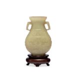 A Chinese russet-celadon jade vase, hu Ming/Qing dynasty, 17th century The weighty vessel of fl...