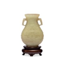 A Chinese russet-celadon jade vase, hu Ming/Qing dynasty, 17th century The weighty vessel of fl...