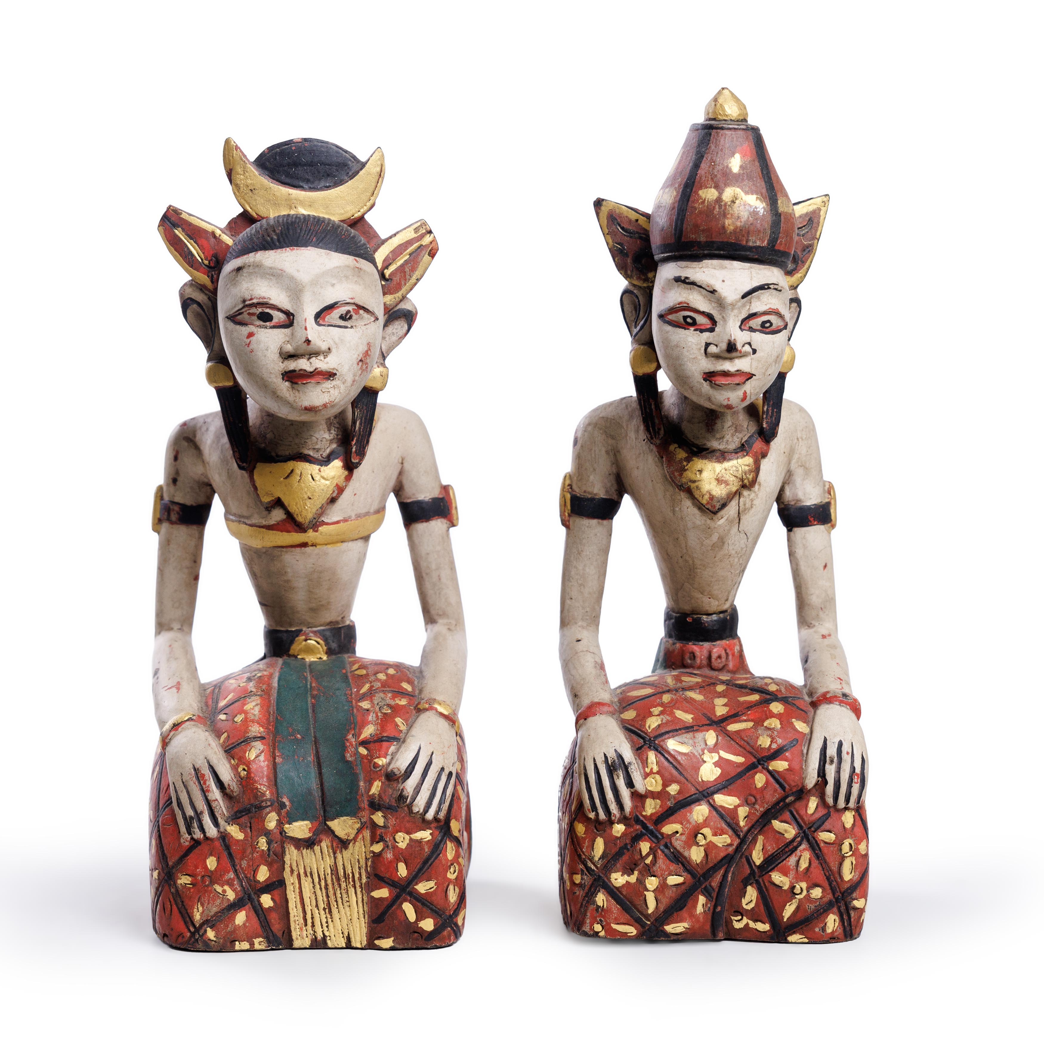 A pair of Javanese painted wood 'wedding couples', Loro Blonyo Indonesia, 19th century The seat...