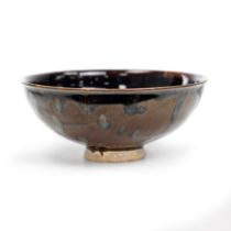 A Chinese Henan 'papercut' black and russet-glazed bowl Song dynasty The buff coloured body cov...