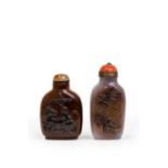 Two Chinese carved agate snuff bottles Qing dynasty, 19th century The first, from a greyish sto...