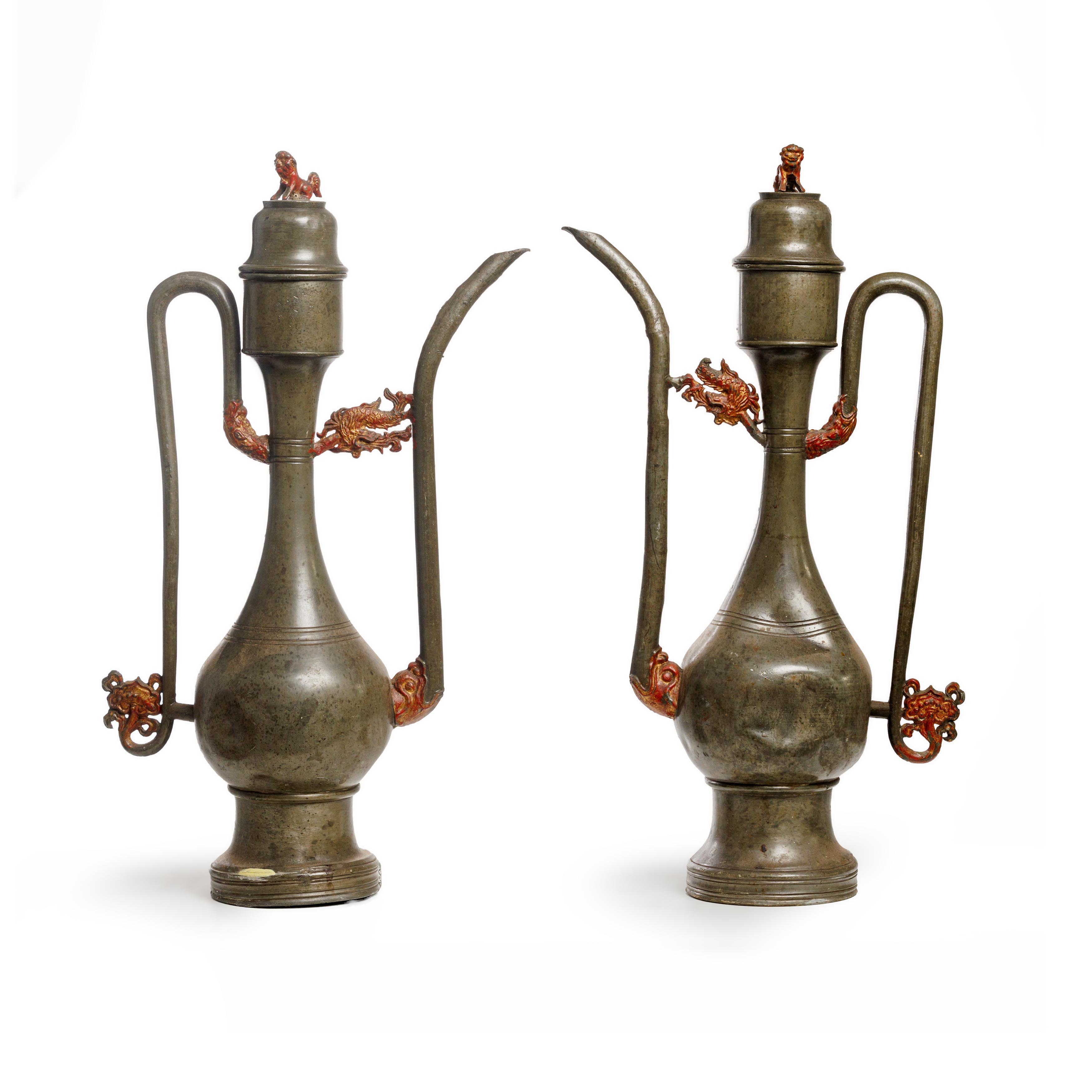 A pair of Chinese parcel lacquered ‘Makara’ pewter wine ewers and covers Qing dynasty, 19th cent...