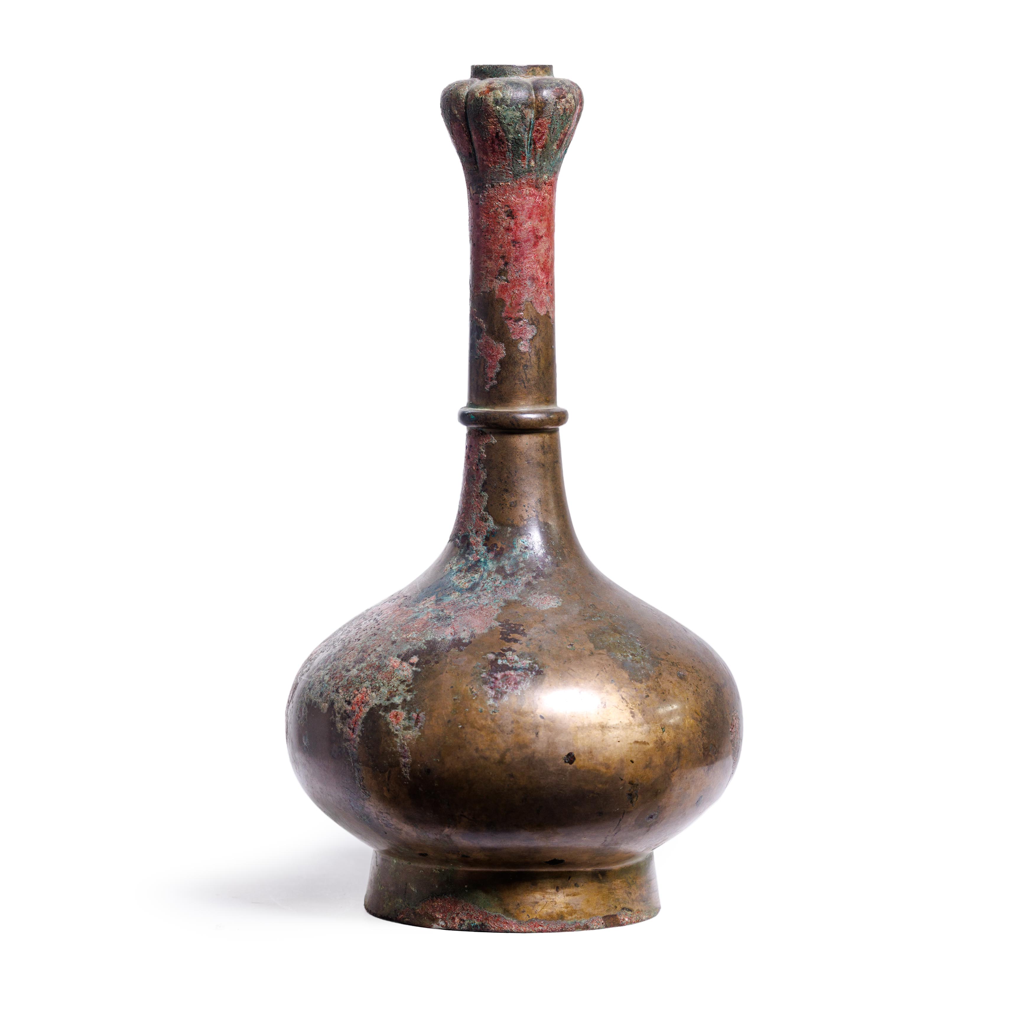 A Chinese archaic bronze garlic mouth wine vessel, suantouping Han dynasty The compressed globu...