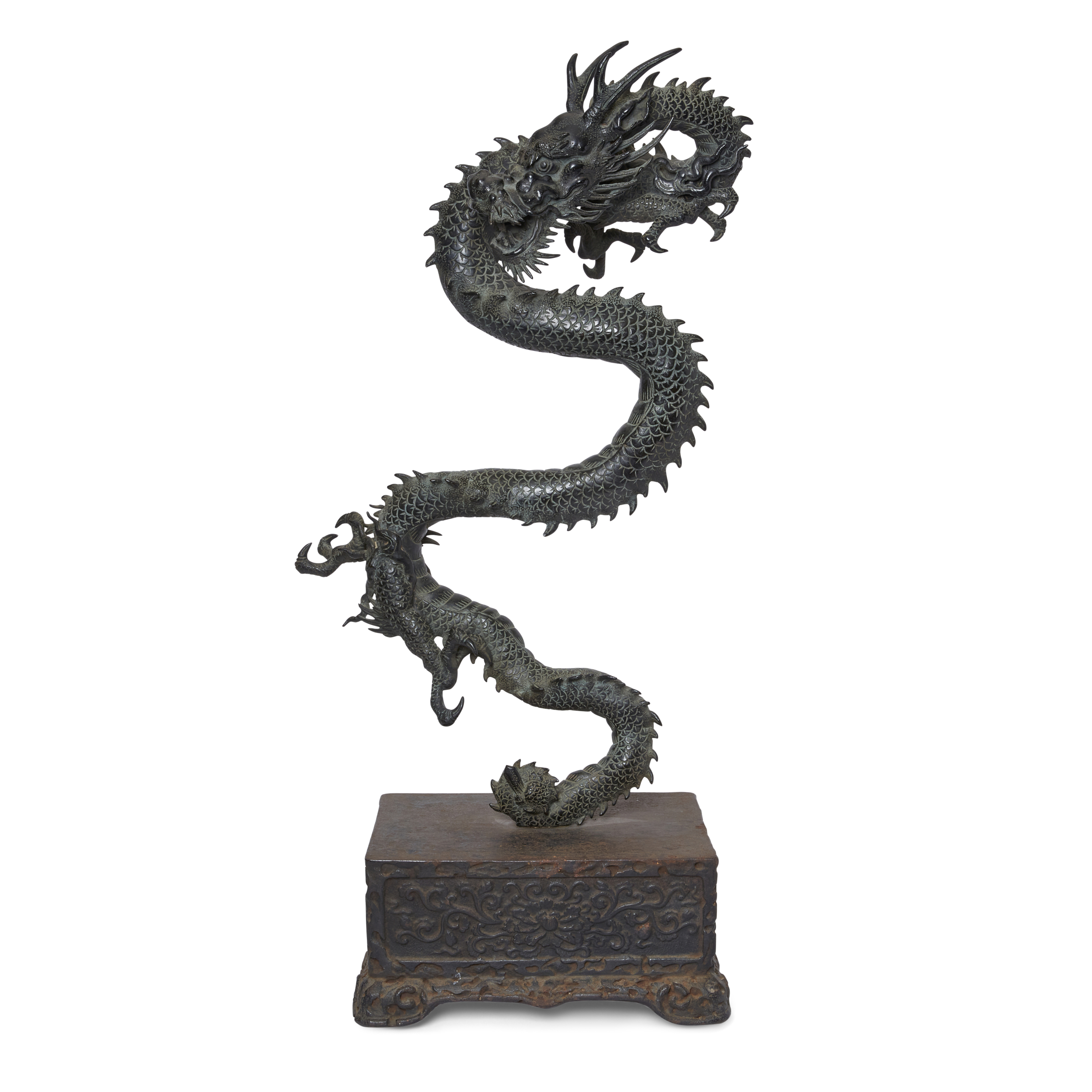 A massive Japanese bronze okimono of a dragon Meiji period, 19th century The three-clawed, scal...