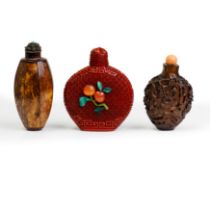 A Chinese hardstone inlaid cinnabar lacquer snuff bottle and two coconut snuff bottles 20th cent...