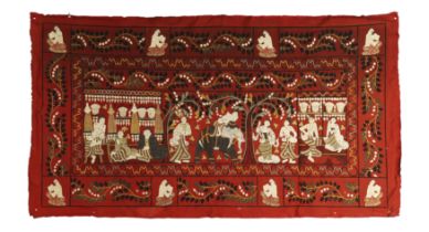 A large Burmese stitched felt hanging Early 20th century The central panel with a figure atop a...