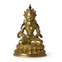 A Sino-Tibetan gilt bronze Bodhisattva 18th century The heavily casted figure seated on a waist...