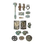 A group of eleven Ordos bronze and gilt bronze plaques and ornaments 6th - 2nd BC Comprising a ...