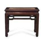 A Chinese hongmu bench, Qing dynasty, 19th century The rectangular top with soft caned seat abo...