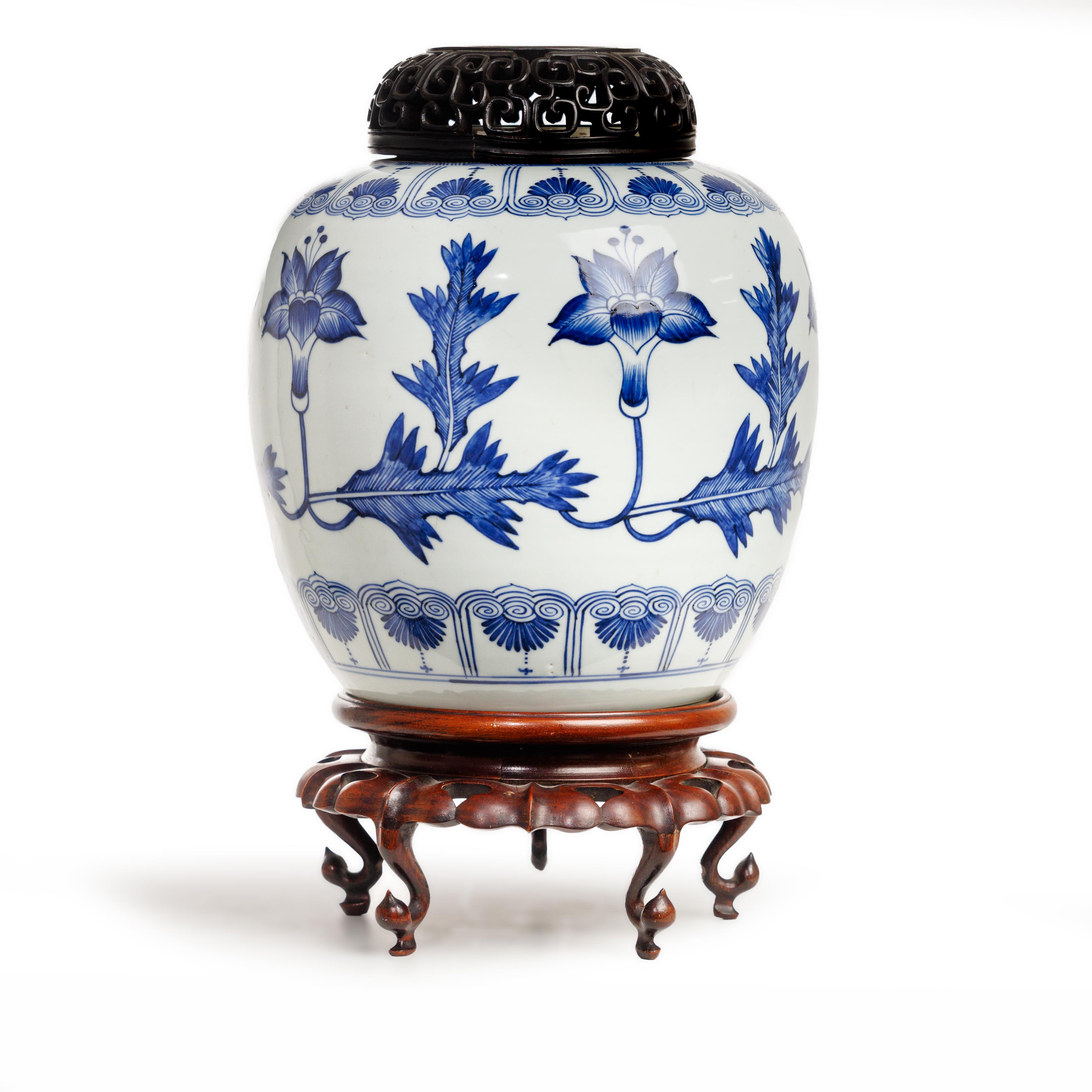 A large Chinese blue and white 'lotus' jar Qing dynasty, 18th century Decorated with a continuo...