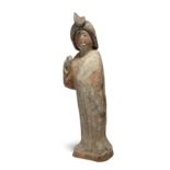 A Chinese painted pottery figure of a court lady Tang dynasty With thickly-painted eyebrows and...