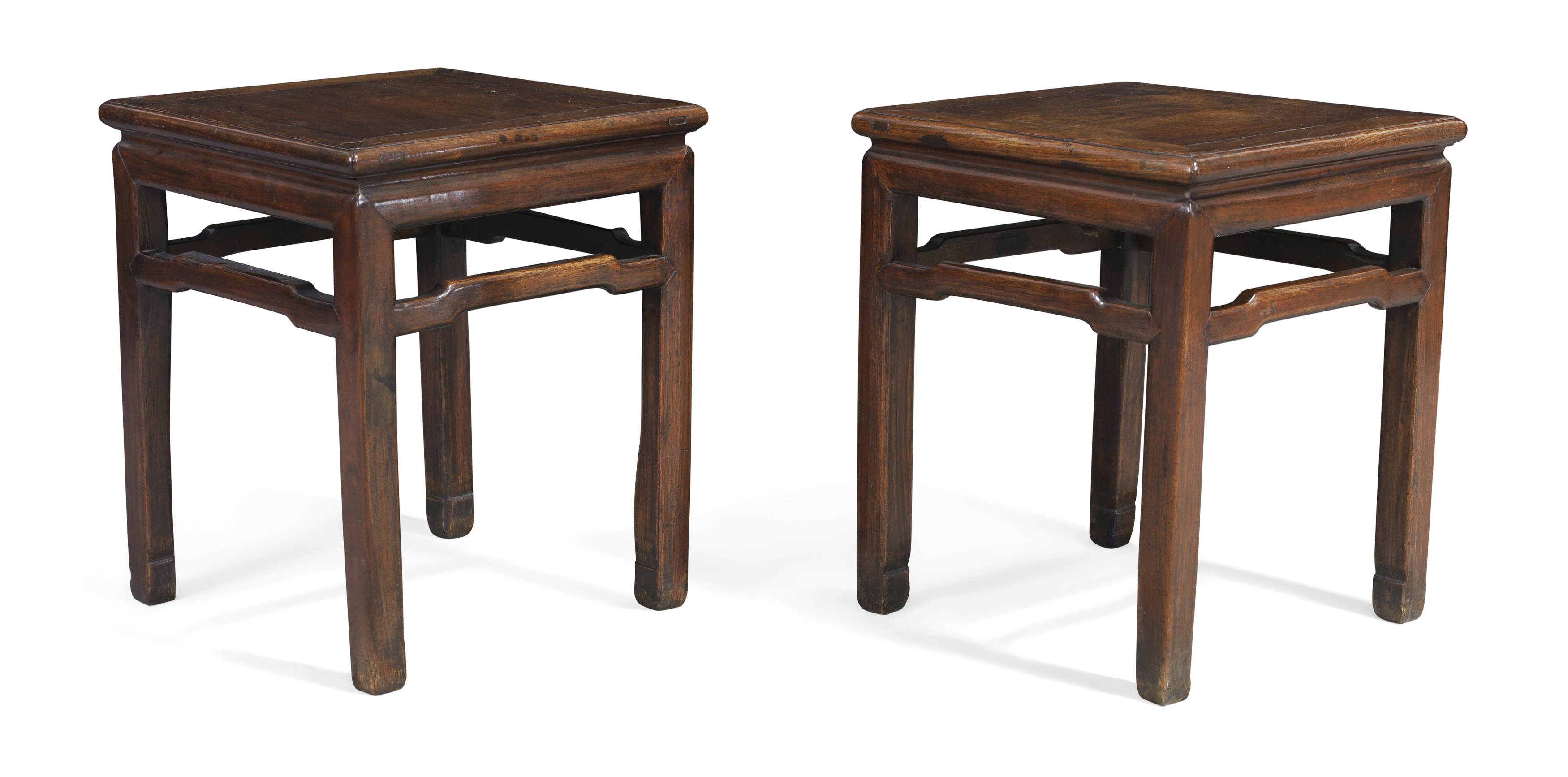 A pair of Chinese hongmu Ming style square stools, Qing dynasty, 19th century With open frieze ...