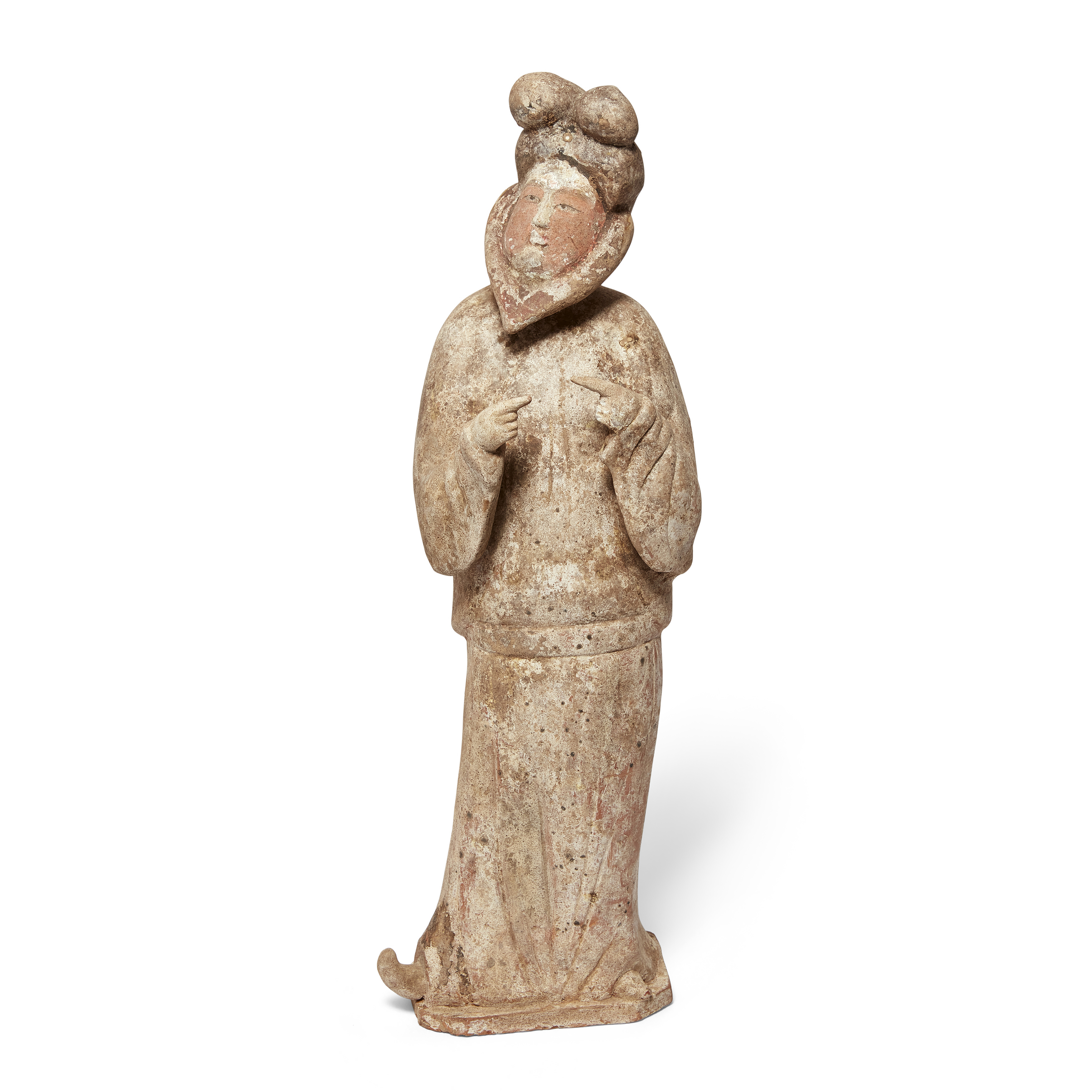 A Chinese pottery figure of a bearded man Tang dynasty Modelled gracefully looking into the dis...