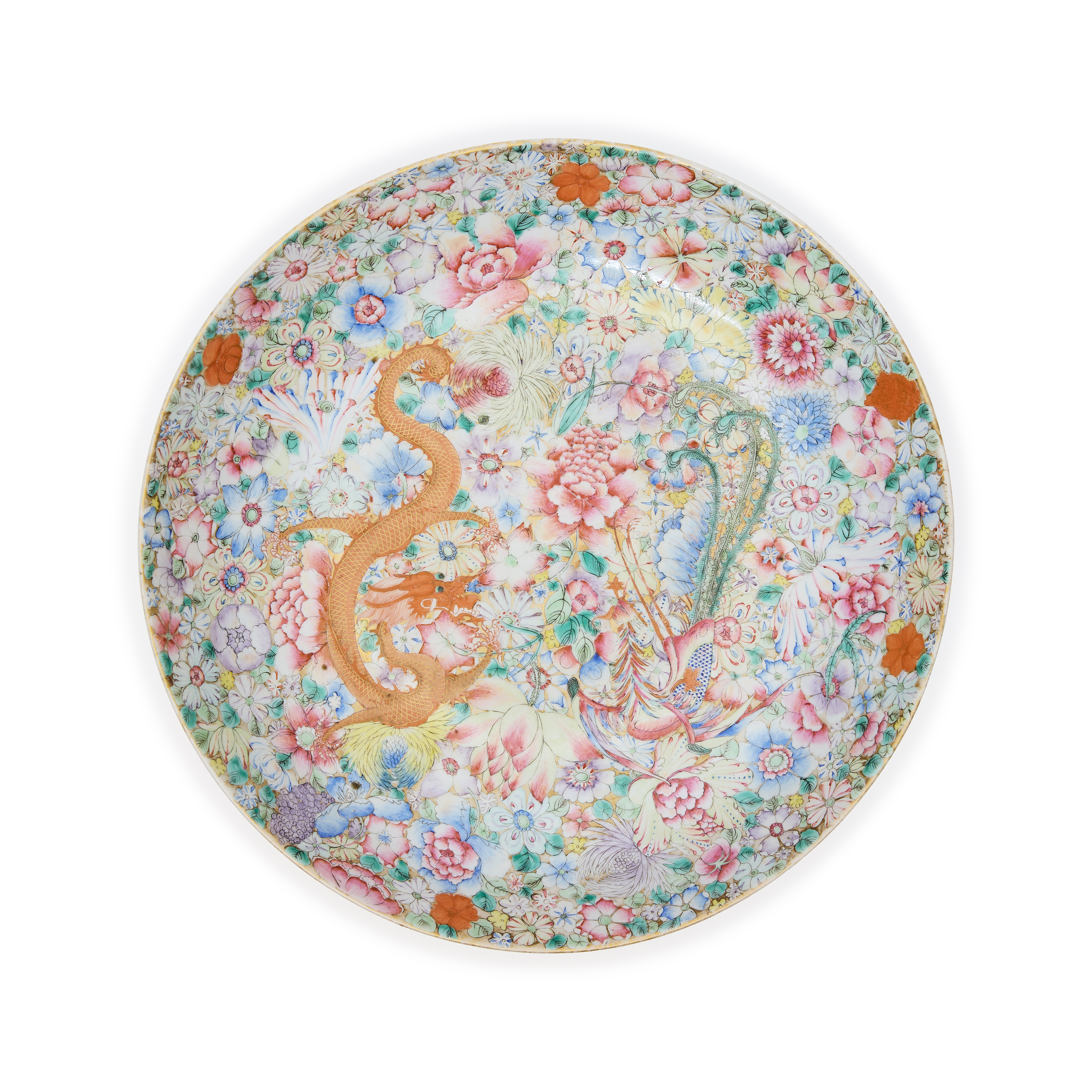 A large Chinese millefleur famille rose dish Republic period Decorated with a dragon and phoeni...