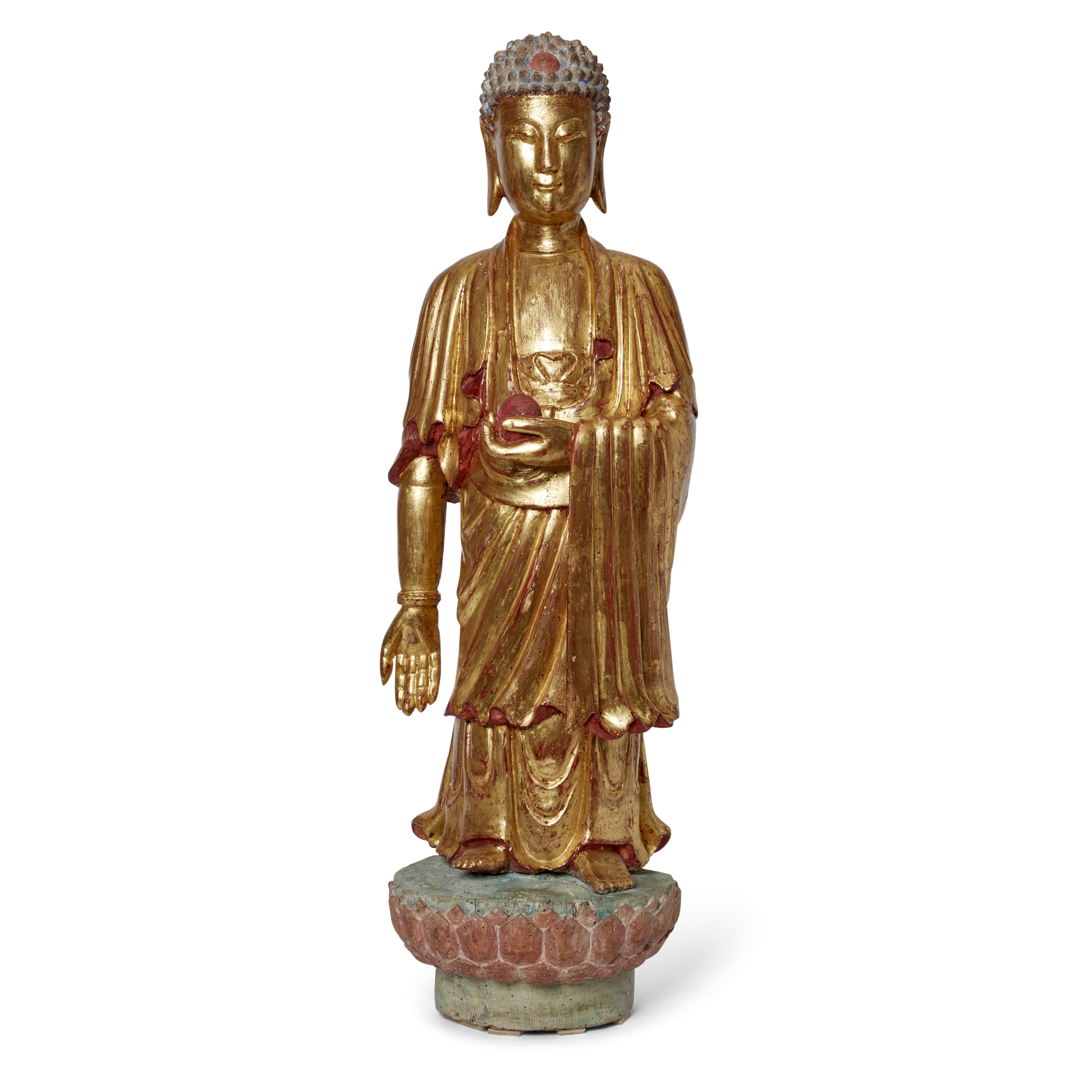 A Chinese painted and gilt-lacquered wood standing figure of Buddha Ming dynasty Wearing thickl...