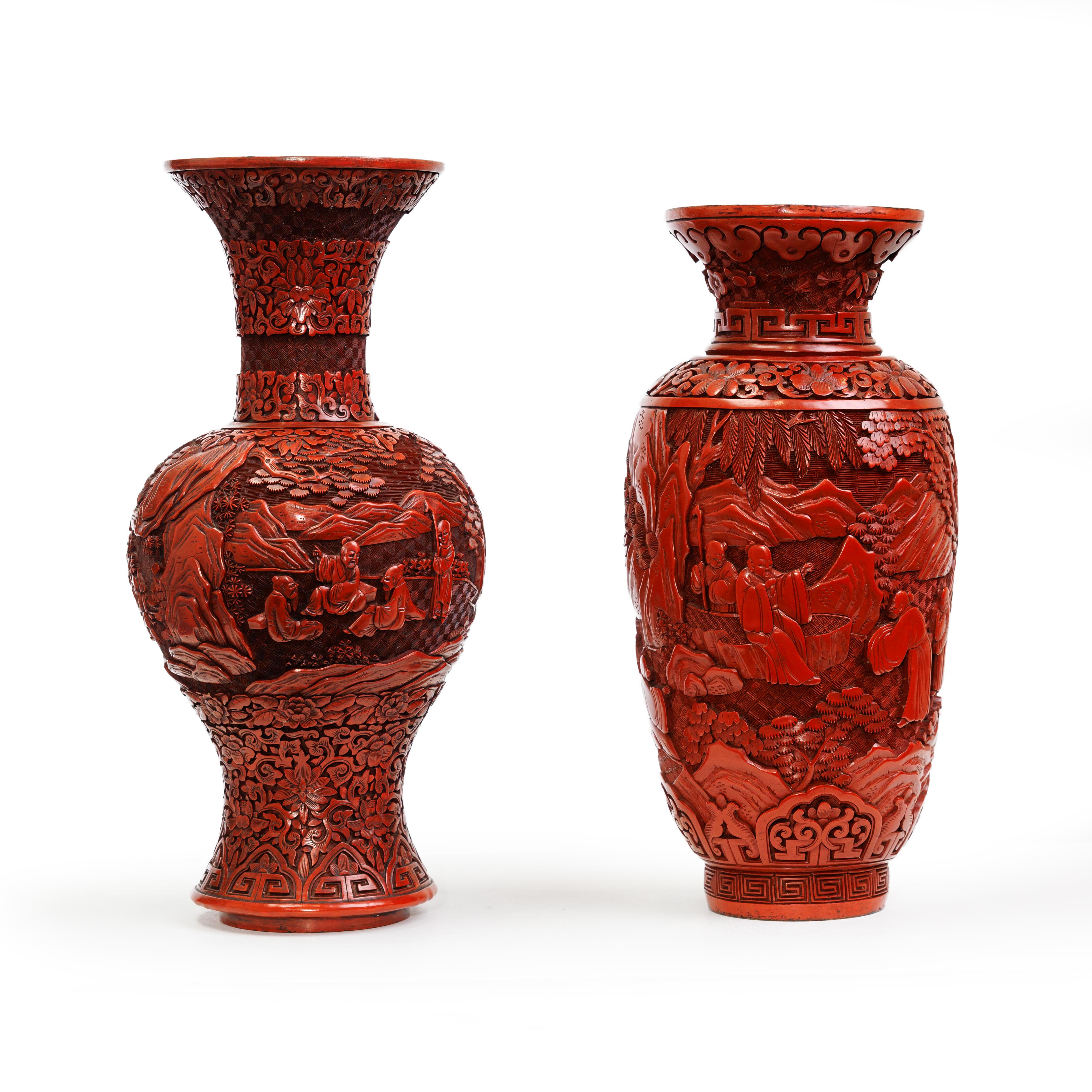 Two Chinese carved red lacquer vases Qing dynasty, 19th century One with ovoid body and flared ...