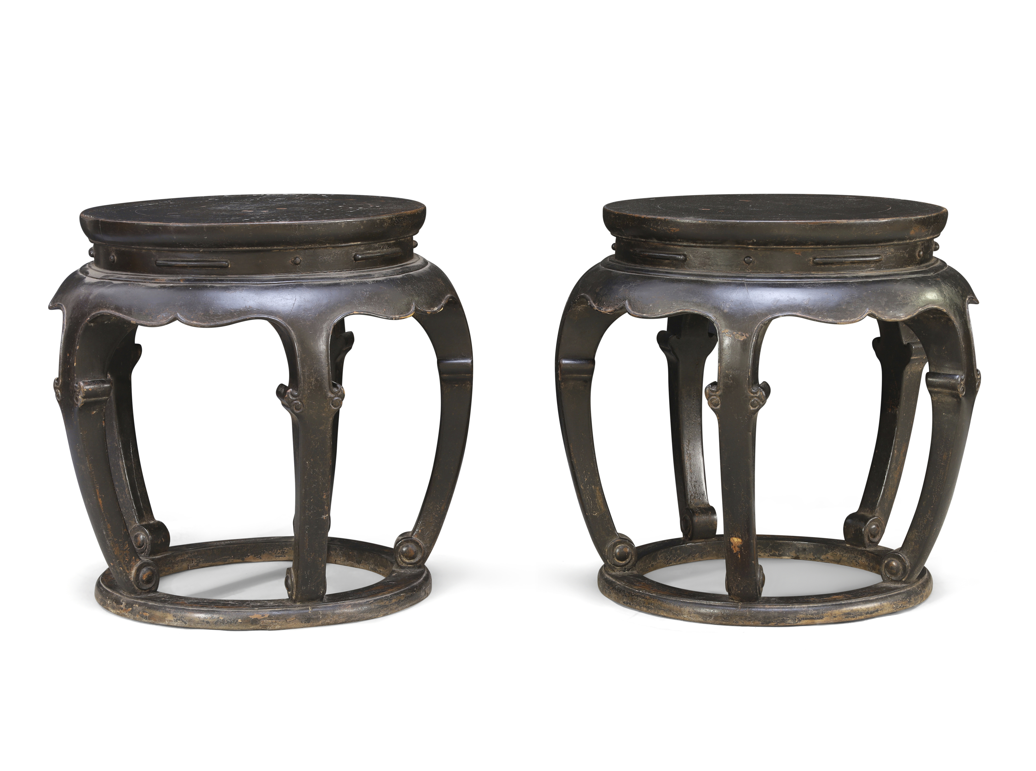 A pair of large Chinese black lacquer drum form stools, Late Ming dynasty, 17th century The cir...