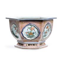A Chinese verte-Imari jardinière Qing dynasty, 18th century Each side with shaped recessed pane...