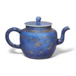 A Chinese powder blue and gilt teapot and cover Qing dynasty, Kangxi period Covered to the exte...