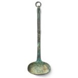 A Chinese archaic bronze ritual ladle Han dynasty The handle with stylised tiger head midway, s...