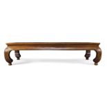 A Chinese elm day bed 20th century The rectangular top above waisted pierced frieze and stepped...