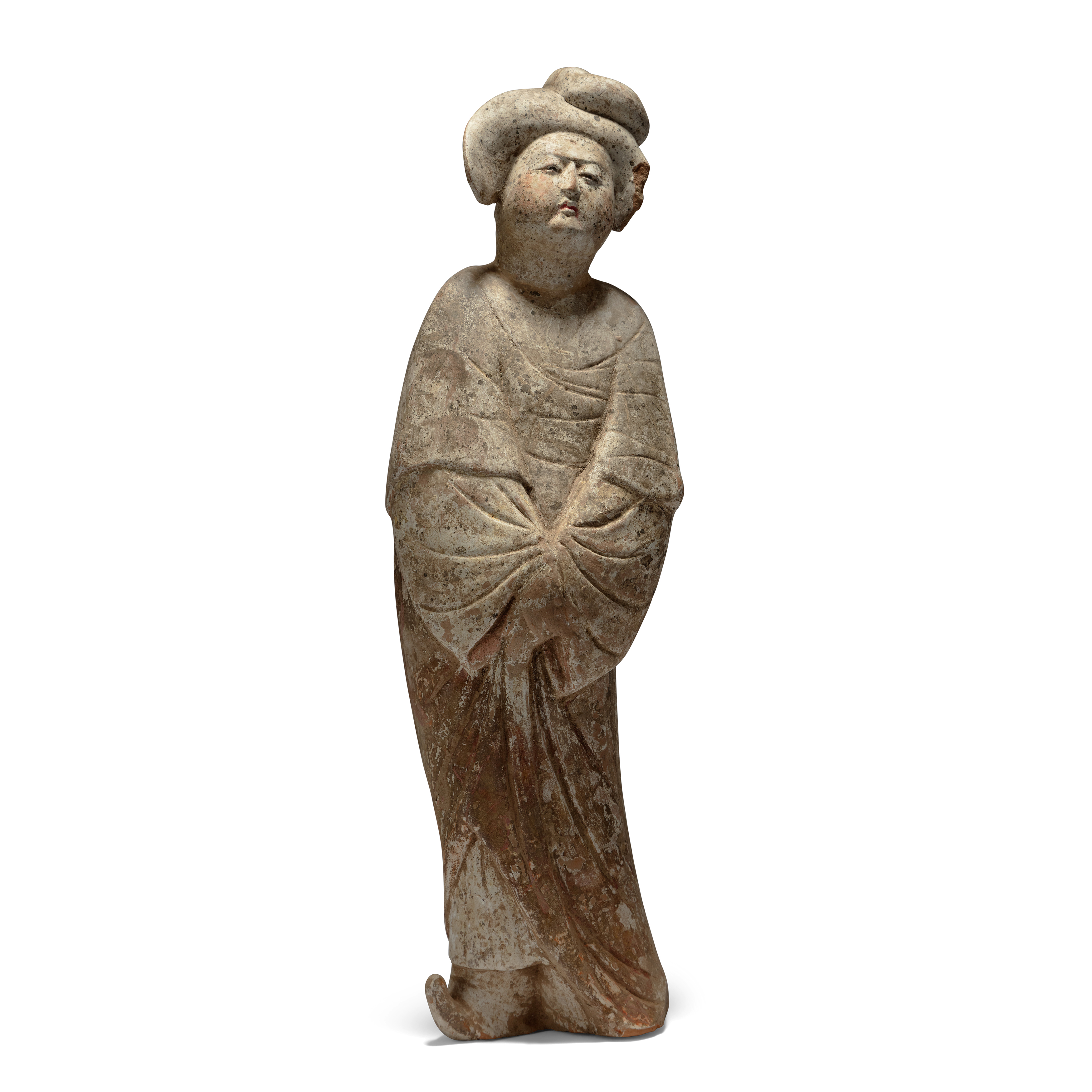 A Chinese painted pottery figure of a court lady Tang dynasty Standing slightly swaying, her ha...