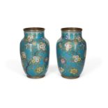 A pair of Chinese cloisonné-enamel vases Late Qing dynasty The turquoise ground decorated with ...