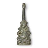 A Chinese bronze belt hook Han dynasty With stylised horned beast head hook, the body cast as a...